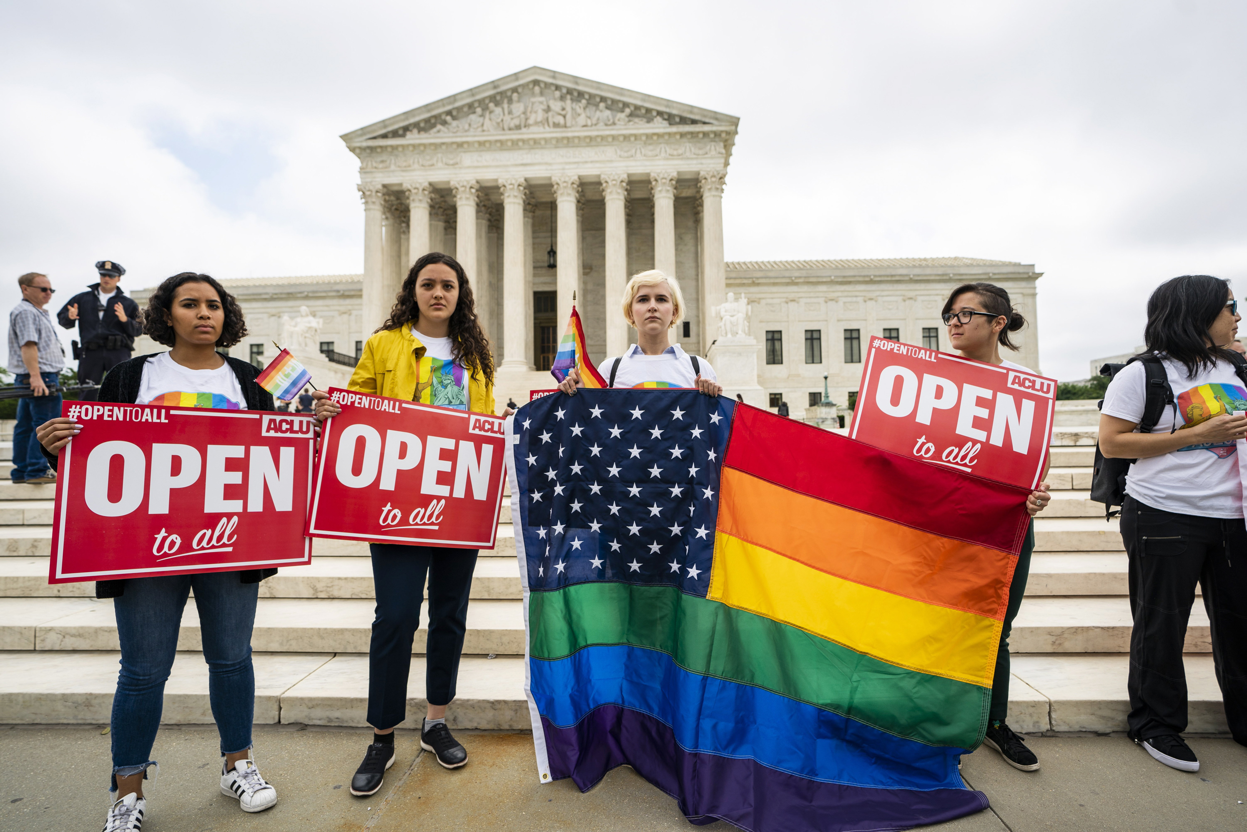 Supporters of the American Civil Liberties Union (ACLU) gather to protest the Supreme Court decision to side with a Colorado baker who refused to bake a cake for a same sex couple in Colorado in Washington, DC, 04 June 2018. The majority ruling was 7-2 in the closely watched case.  EPA/JIM LO SCALZO
